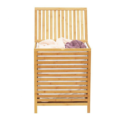 Un panier à linge en bambou portable avec étagère couvercle